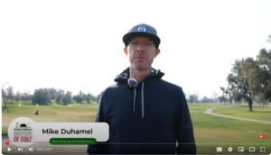 Man in hat on golf course